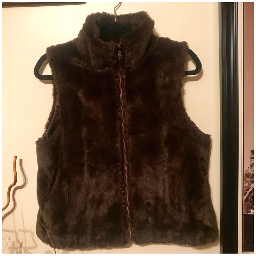 Brown faux fur zip up vest.